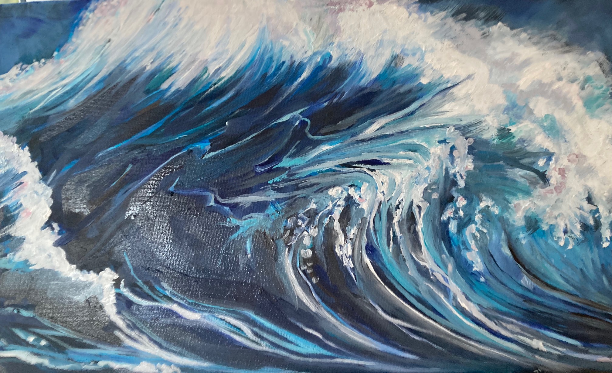 Seascape. Stormy sea with huge waves of multiple shades of blue, white and grey.